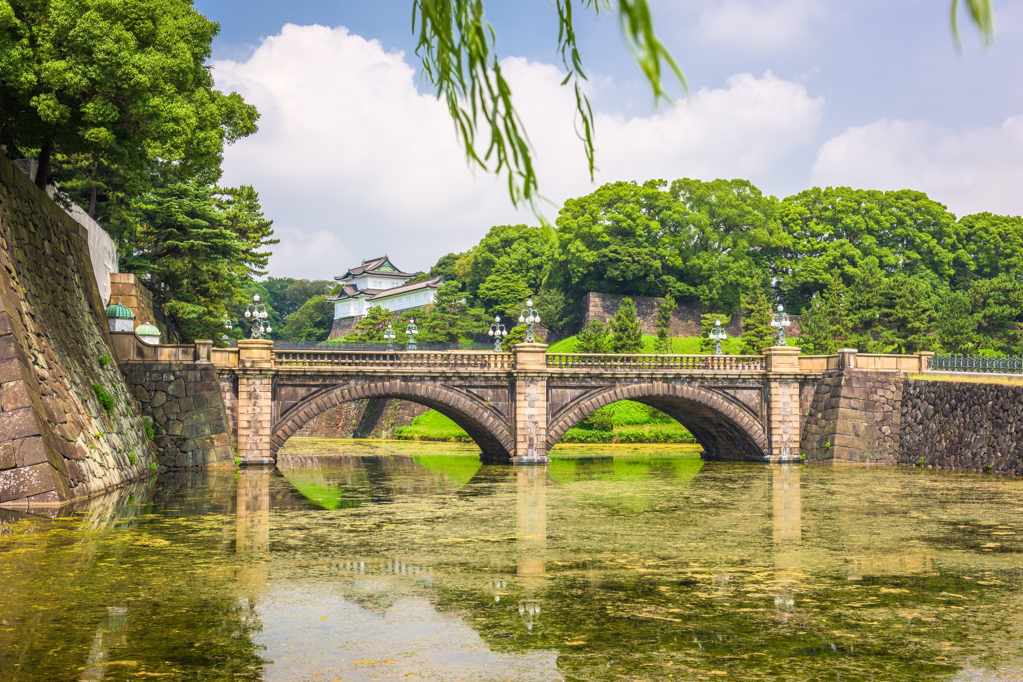Tokyo, Japan at the Imperial Palace moat and bridge.