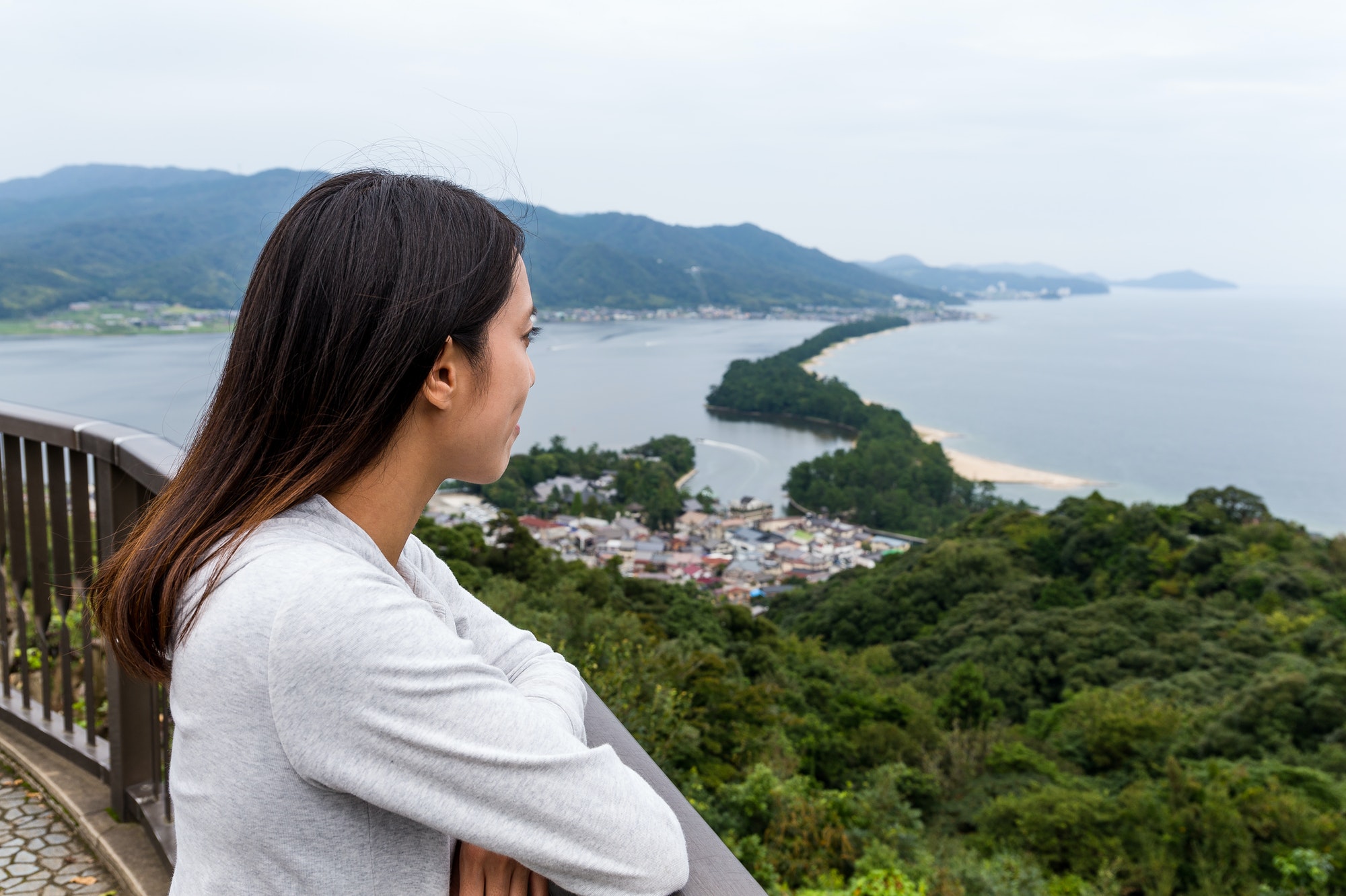Woman travel in amanohashidate at Japan