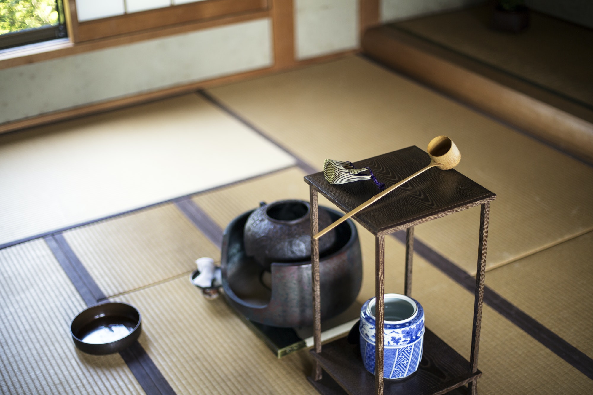 Traditional Japanese Tea Ceremony, container and small stand with a Hishaku, a bamboo ladle